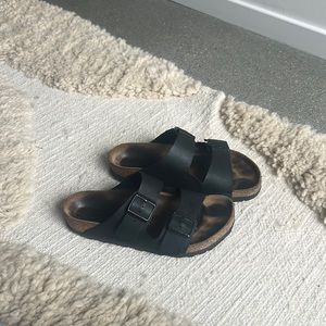 black leather Birkenstocks